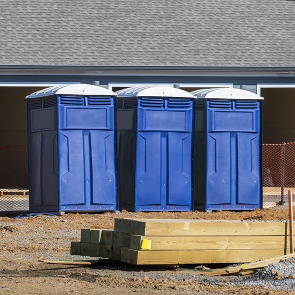 what is the cost difference between standard and deluxe porta potty rentals in Kangley